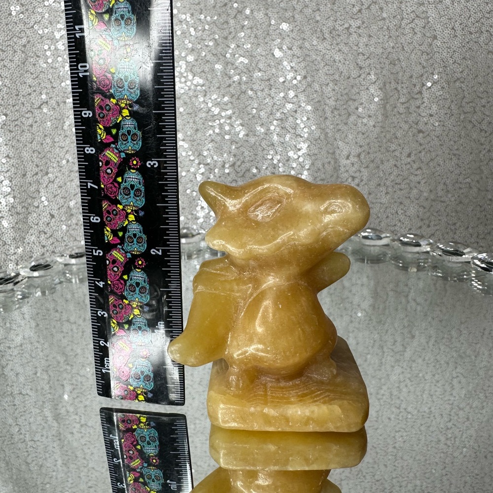 Orange calcite cubone Pokemon crystal carving